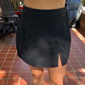 Princess Polly black denim skirt. The “Lola” mini skirt.